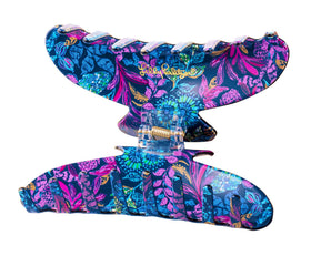 Lilly Pulitzer interior with gold logo highlighting brand detail