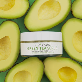 LILY SADO jar beside avocado illustrating moisturizing benefits from avocado