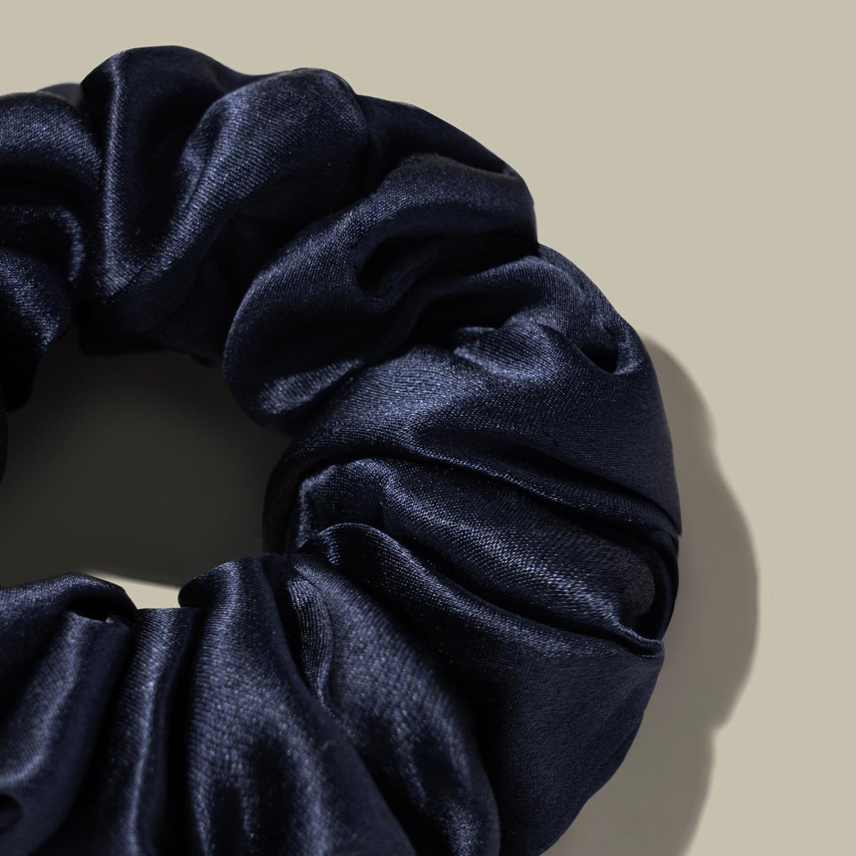 LilySilk scrunchie used in a bun showcasing secure style and hair protection
