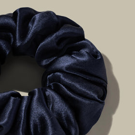LilySilk scrunchie used in a bun showcasing secure style and hair protection