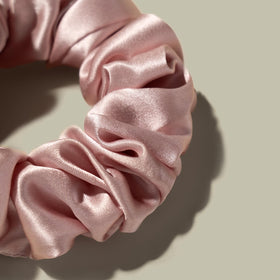 LilySilk scrunchie worn in a low ponytail demonstrating gentle hold and no crease