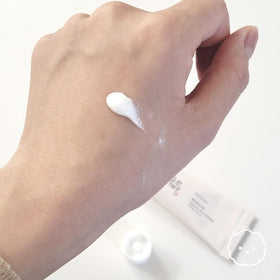 LING LI TE LLT cream texture close-up highlighting lightweight absorption and hydration