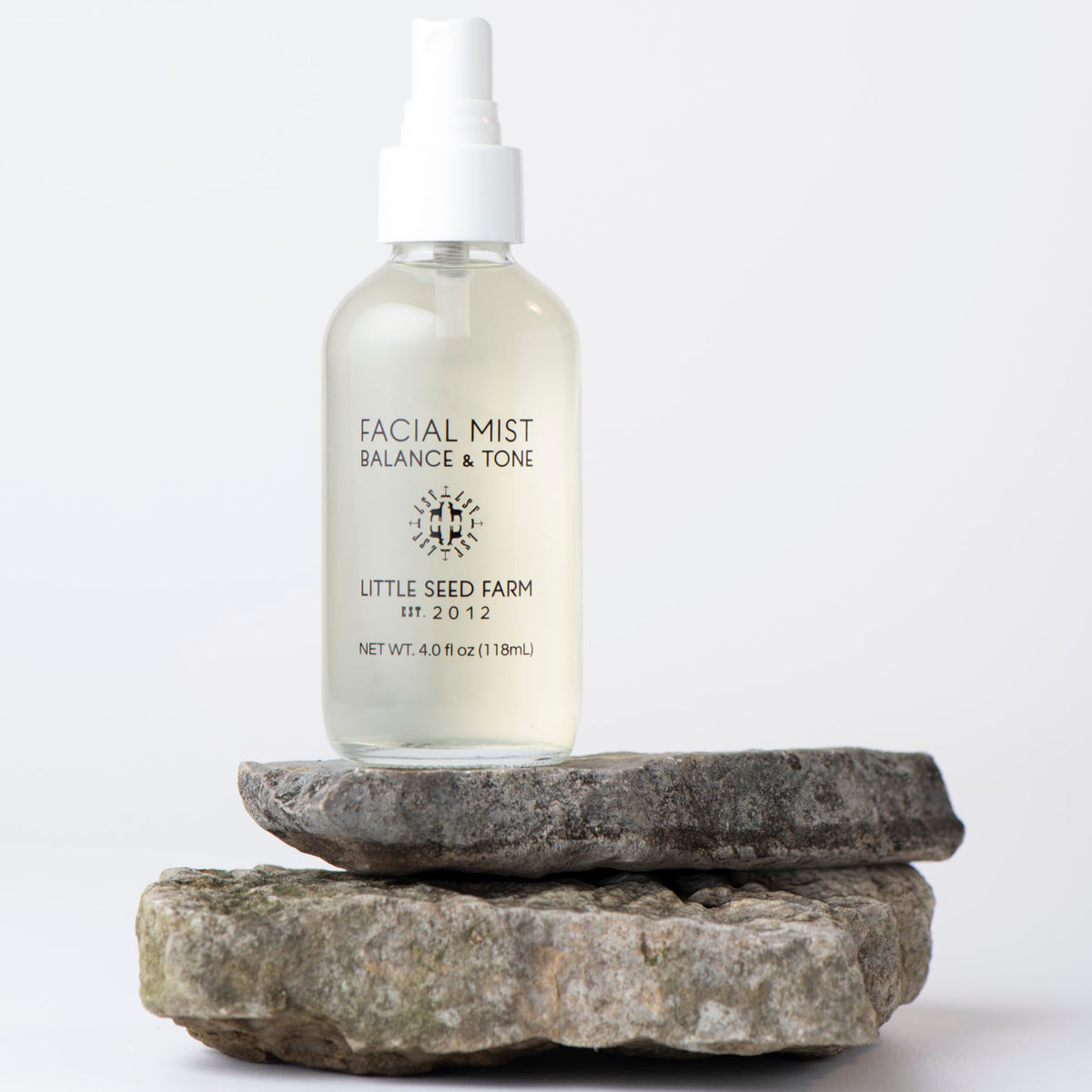 Little Seed Farm lifestyle shot on bathroom vanity promoting gentle routine
