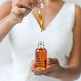 Little Seed Farm serum spread on skin demonstrating lightweight texture and absorption