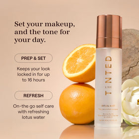 Live Tinted mist spraying a fine cloud that sets makeup evenly for long wear