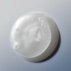 Living Proof Advanced Clean Dry Shampoo sprayed at roots to refresh and absorb oil