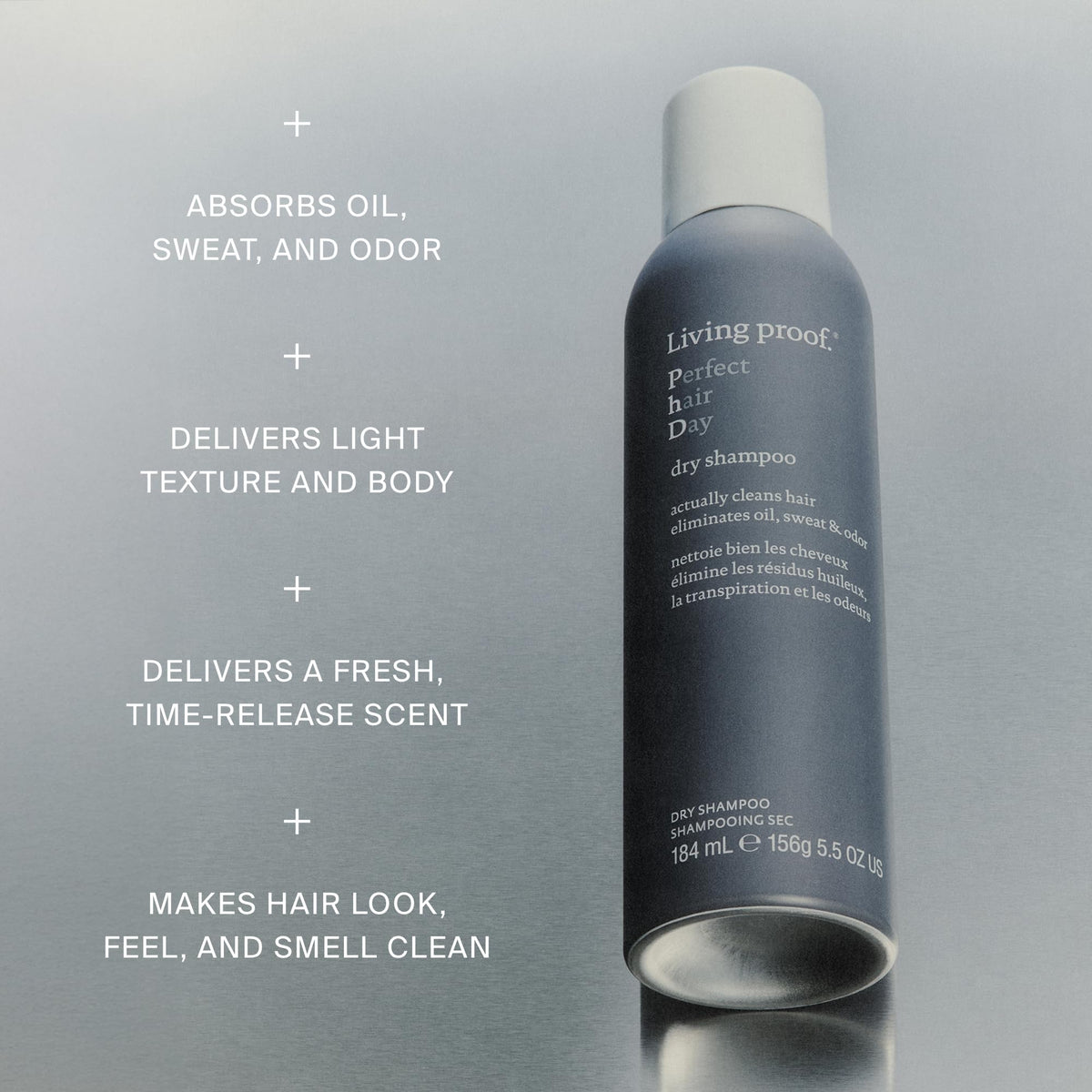 Living Proof applying product to roots with hands to refresh scalp