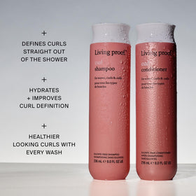 Living Proof curl shampoo label close-up highlighting strengthening ingredients