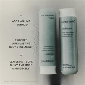 Living Proof conditioner being rinsed from hair for lightweight feel