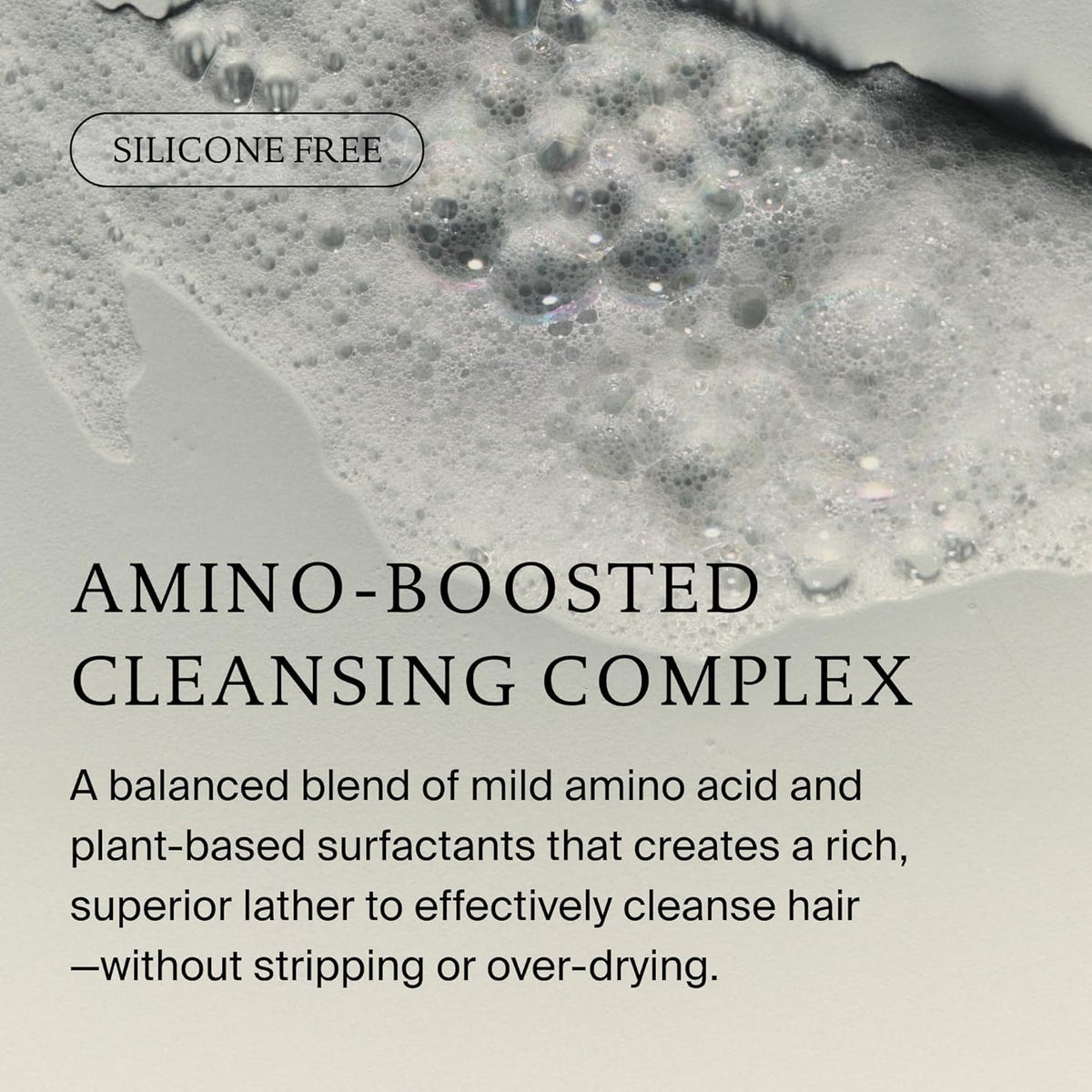 Living Proof Full Shampoo forming lather on hair to show effective cleansing