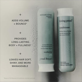 Living Proof Full Shampoo on bath shelf with other toiletries for lifestyle appeal