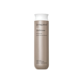 Living Proof front bottle showing label and benefits for frizz control