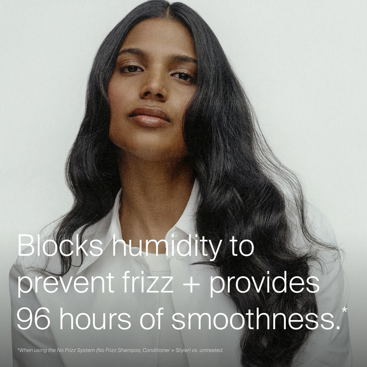 Living Proof dispensing a small amount demonstrating precise control for styling