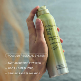 Living Proof size comparison with hand illustrating travel-friendly convenience