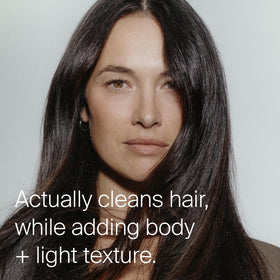 Living Proof fine mist close‑up showing even application and lighter hair