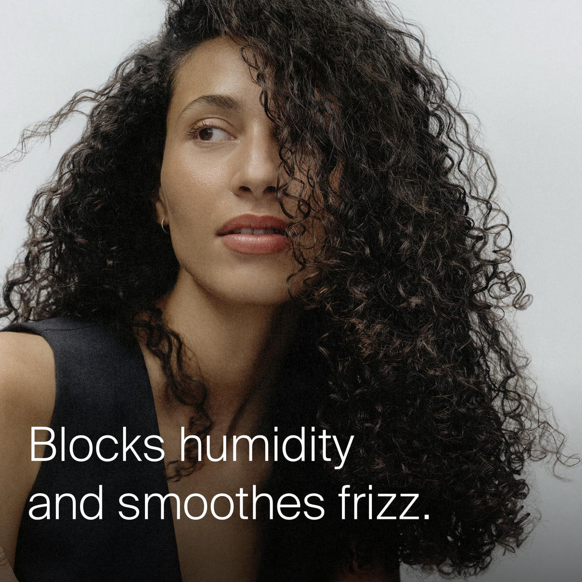 Living Proof oil texture drops on surface demonstrating lightweight absorption