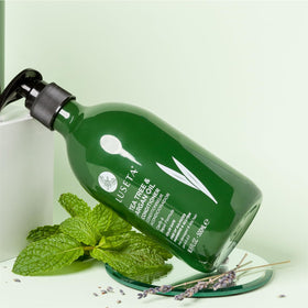 L LUSETA creamy rinse-out foam on hand showing quick-rinse benefit