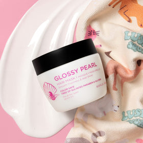 L LUSETA mask applied to hair in hand demonstrating easy application benefit