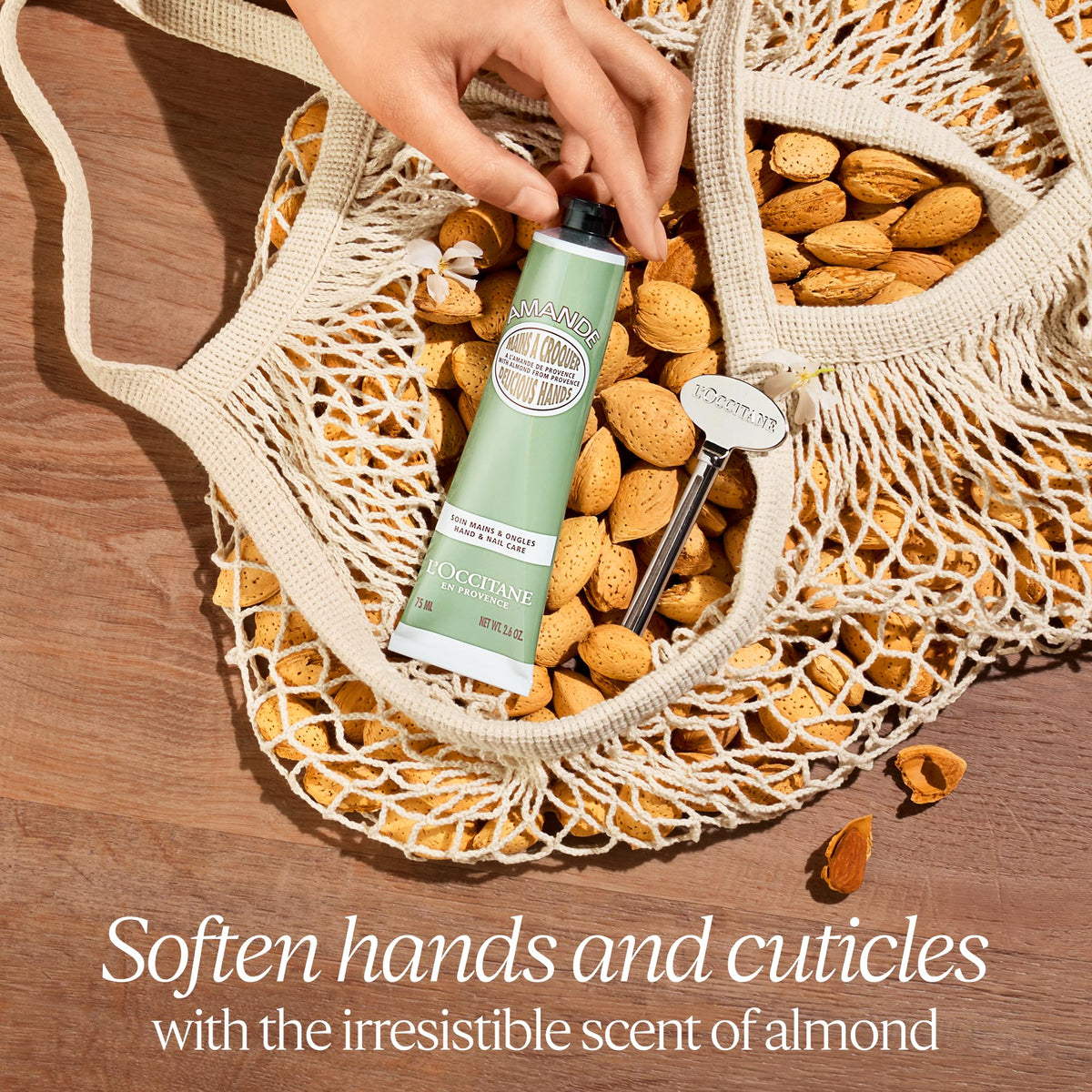 L'OCCITANE tube cap detail of almond hand cream highlighting secure closure and mess-free use benefit