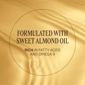 L'OCCITANE almond oil tucked inside travel bag suggesting on-the-go glow convenience