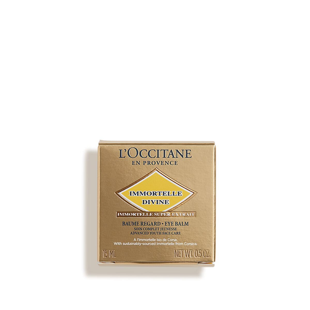 L'Occitane eye balm applied on hand illustrating easy melting and spreadability
