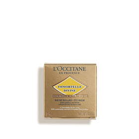 L'Occitane eye balm applied on hand illustrating easy melting and spreadability
