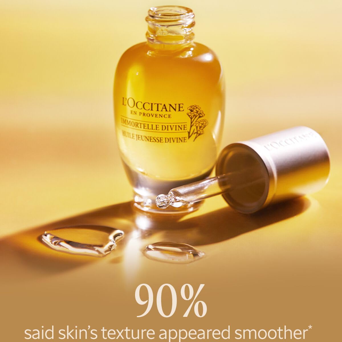 L'OCCITANE oil in hand being applied to skin for nourishing glow