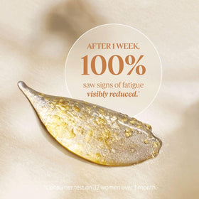 L'OCCITANE texture close-up with golden microcapsules for smoothing benefits