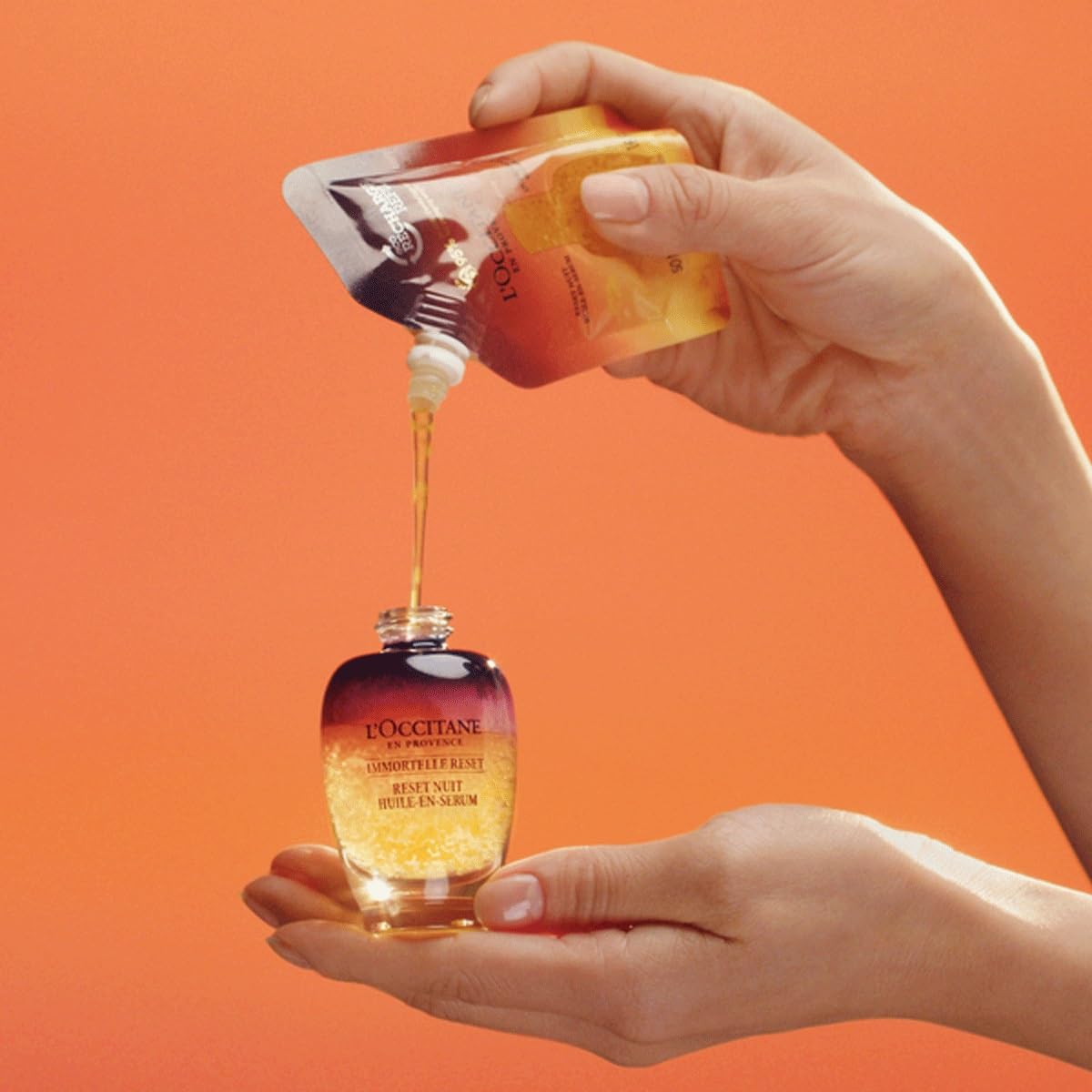 L'OCCITANE golden bubbles close-up highlighting encapsulated immortelle oil benefit