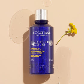 L'Occitane label close-up highlighting Immortelle name and product clarity benefit