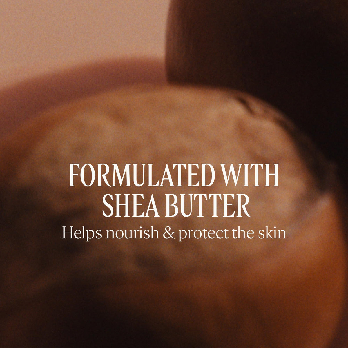 L'OCCITANE balm being applied to hands demonstrating protective moisturization