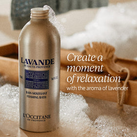 L'Occitane refill pouring into bottle demonstrating easy refill and waste reduction
