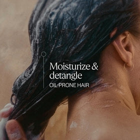 L'OCCITANE creamy conditioner texture close-up, silicone-free smoothness