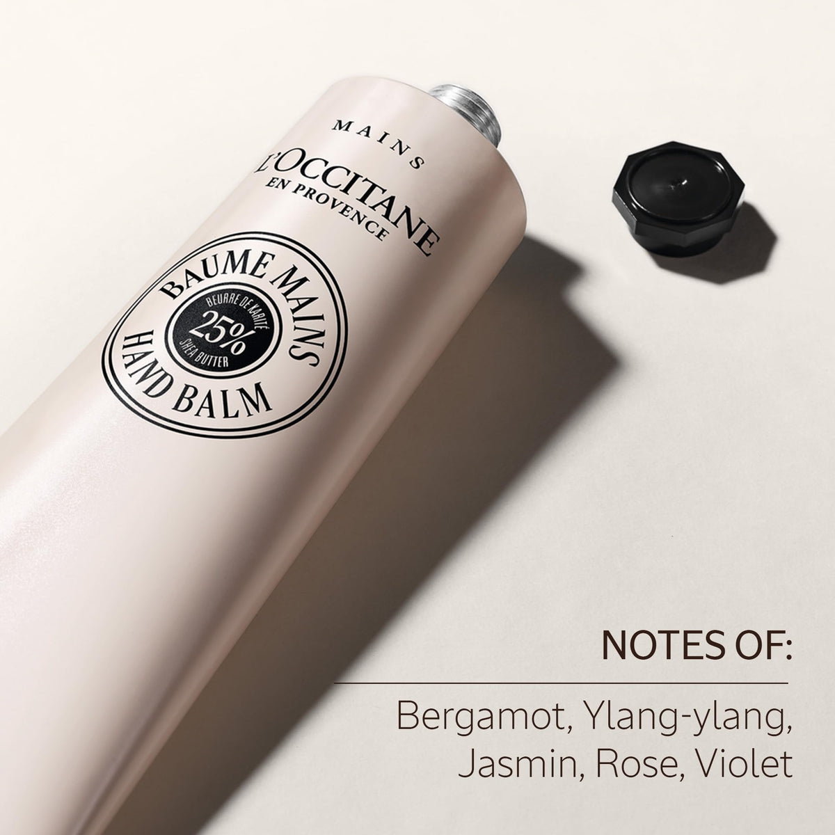 L'OCCITANE tube beside bedside items illustrating overnight repair benefit