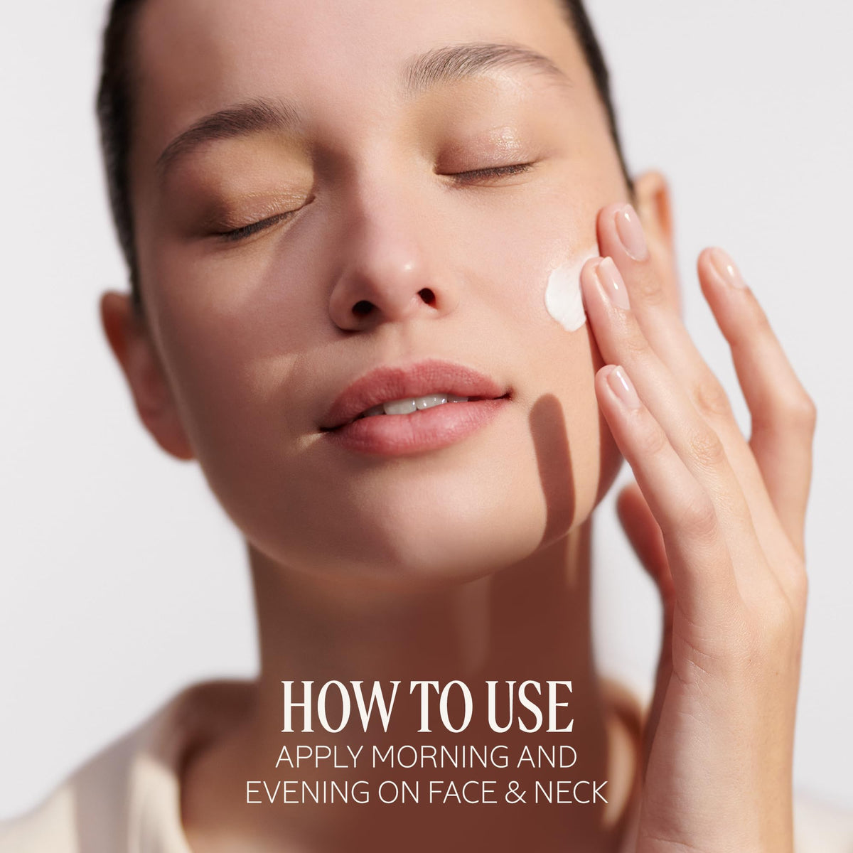 L'OCCITANE cream in hand being applied demonstrating easy absorption and comfort