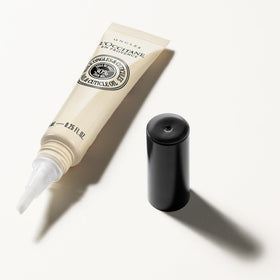 L'Occitane texture drop on finger showing fast-absorbing oil benefit for non-greasy finish