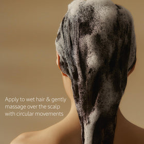 L'OCCITANE shampoo in shower on wet hair showing visible body gain