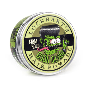 Barbershop scene with stylist using Lockhart's Goon Grease for professional results