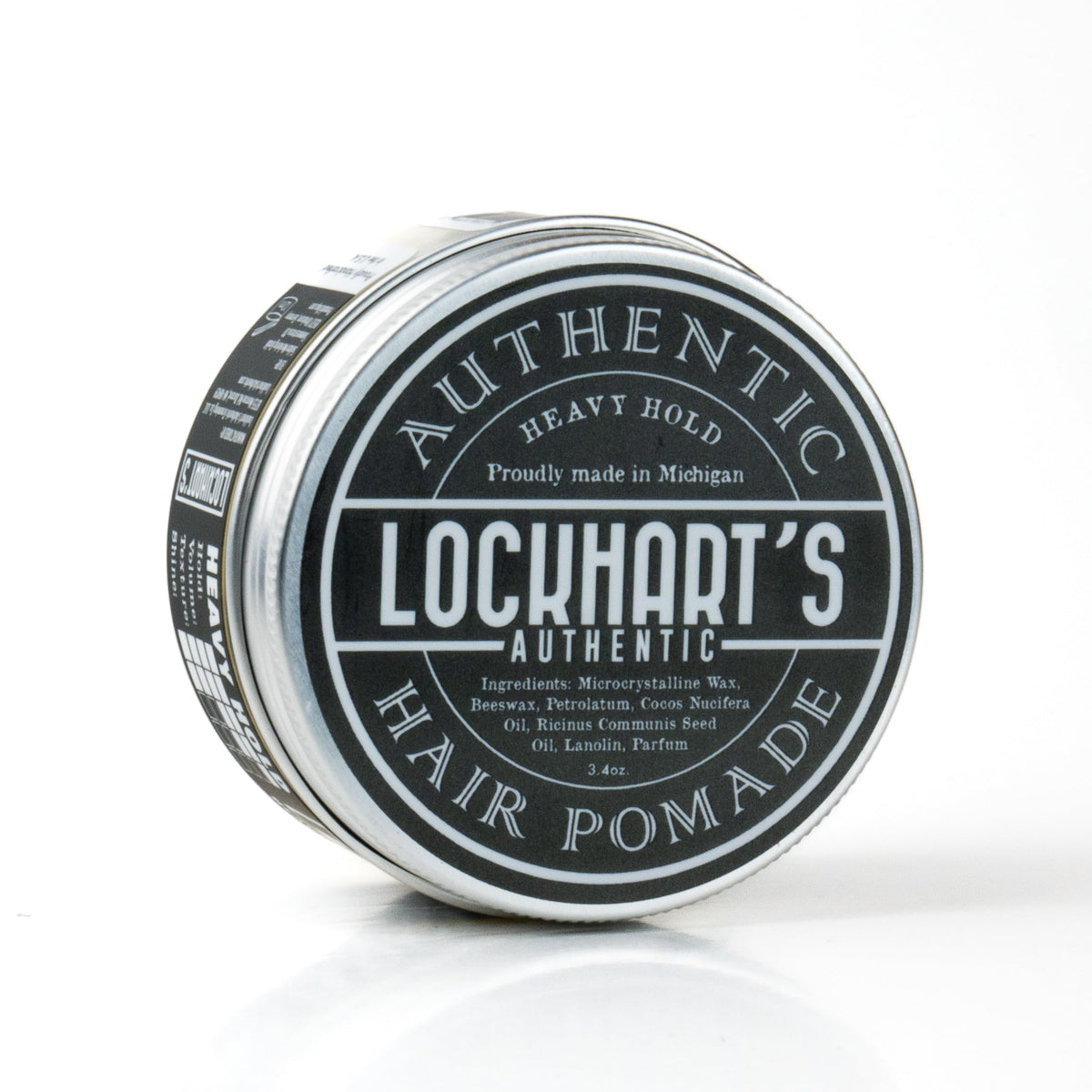 Lockhart's pomade in hands while applying for precise control