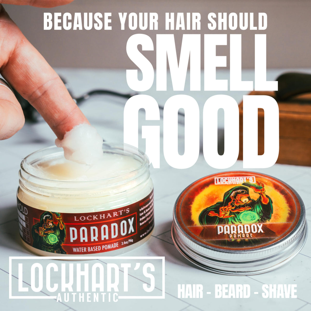 Lockhart's pomade on hands being worked in for smooth application benefit