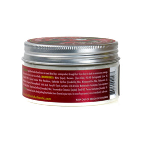 Lockhart's pomade next to a standard object to show 3.4oz scale for portion clarity