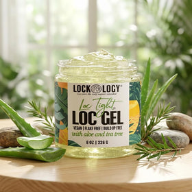 Lockology in lifestyle outdoor setting showing defined, natural locs