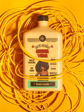 Lola From Rio conditioner creamy texture close-up, demonstrates rich slip for easy detangling and moisture