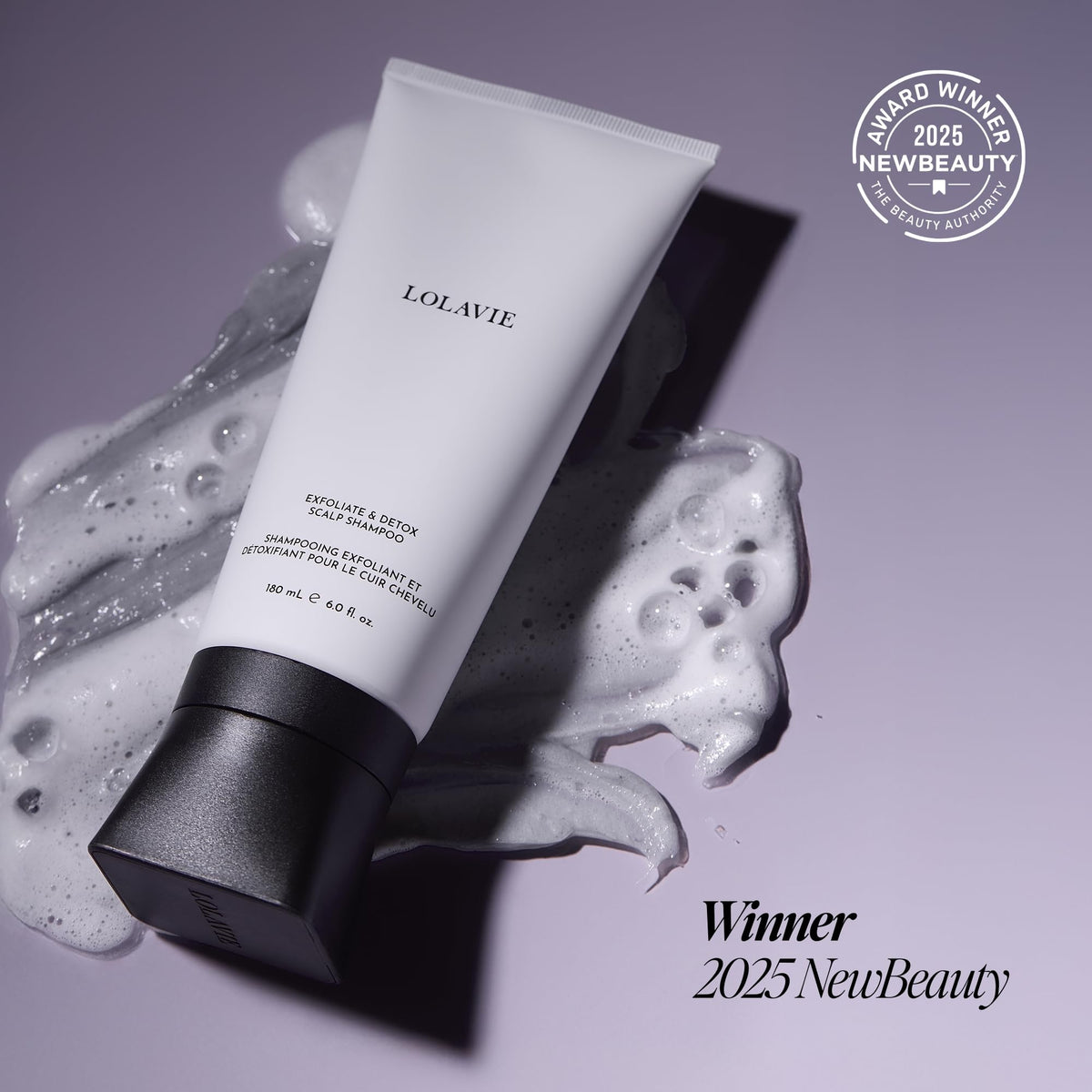 LolaVie applied to wet scalp in sections showing targeted cleaning benefit