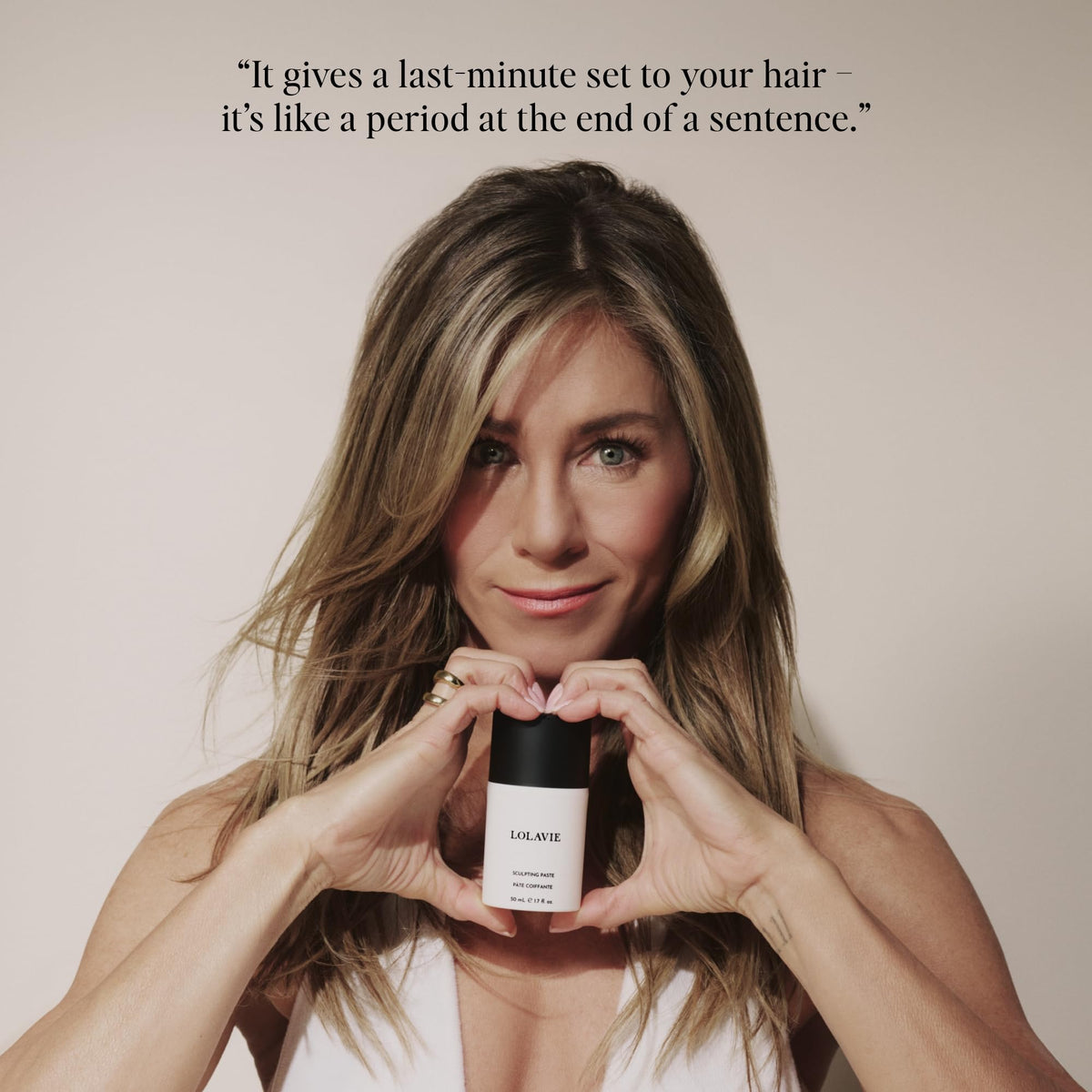 LolaVie sculpting paste being warmed in hands to show easy activation and even application