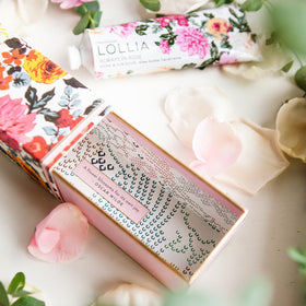 LOLLIA cream texture on fingertip, rich moisturizing consistency benefit