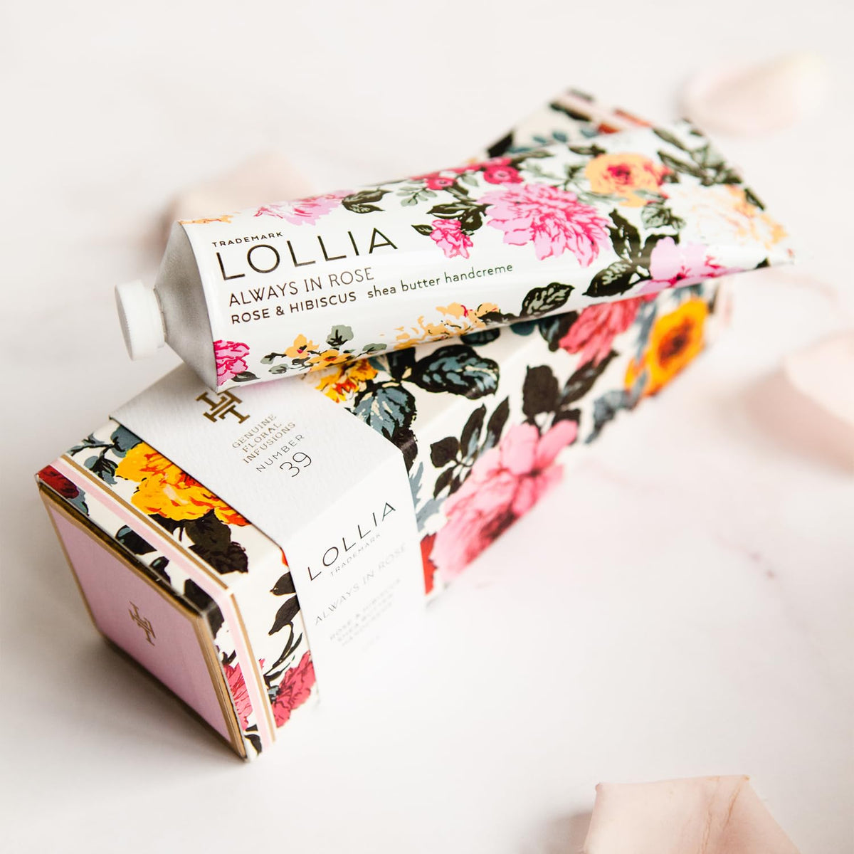 LOLLIA tube detail with embossed logo, easy squeeze application benefit