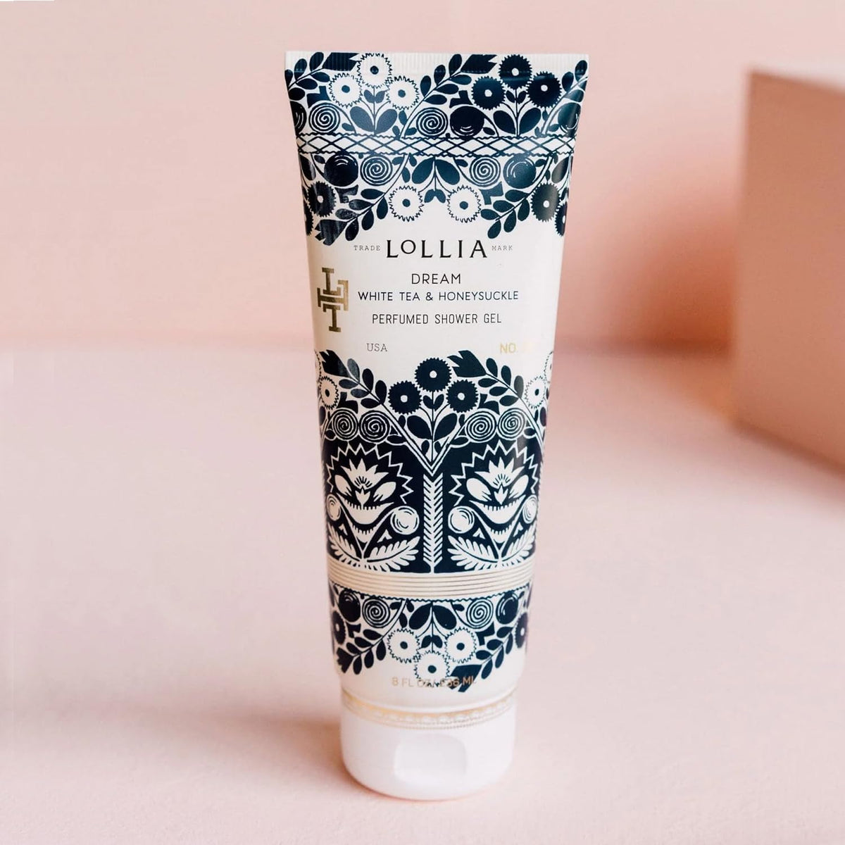 LOLLIA creamy lather on hand highlighting gentle foam and moisturizing texture