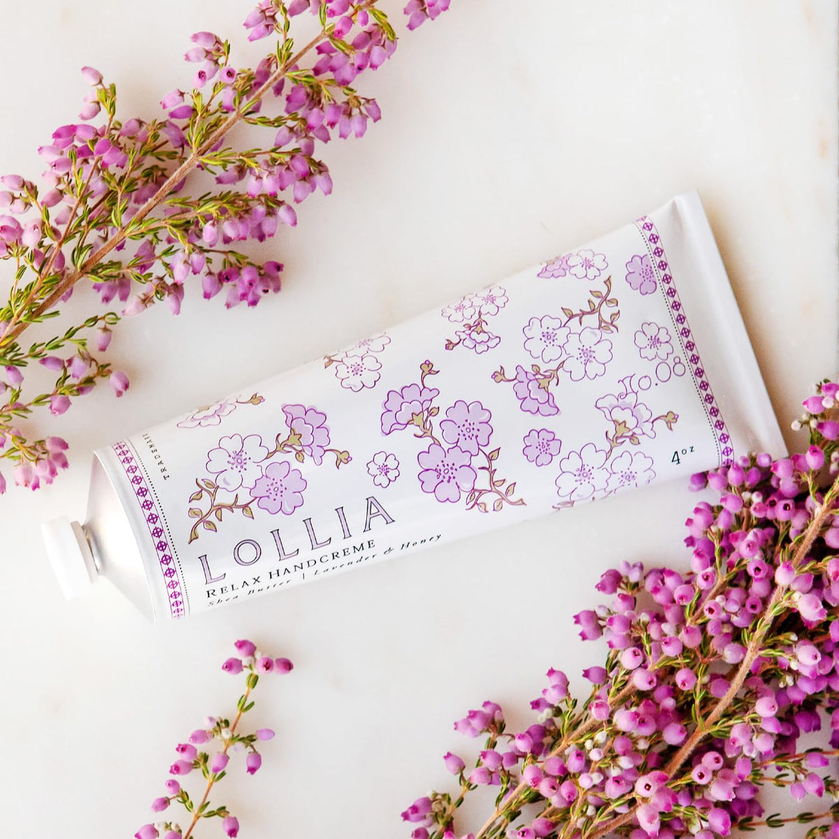 LOLLIA Relax decorative box sleeve detail with golden bees and floral accents