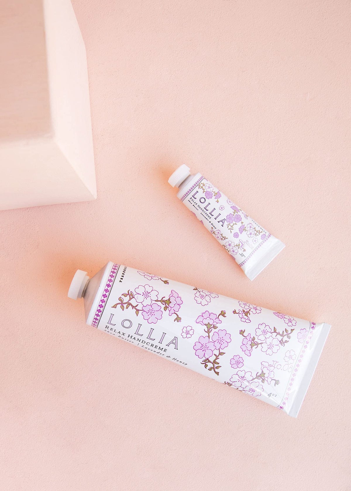 LOLLIA label and ingredients list highlighting botanical oils and butters